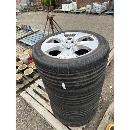 99 - A set of four Alutec aluminium vehicle wheels fitted 255/45ZR18 tyres