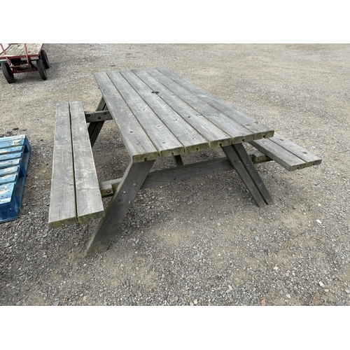 120 - A wooden barbeque table