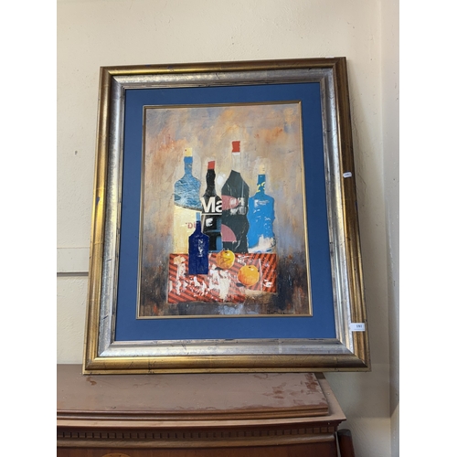 181 - An abstract on canvas depicting bottles and fruit