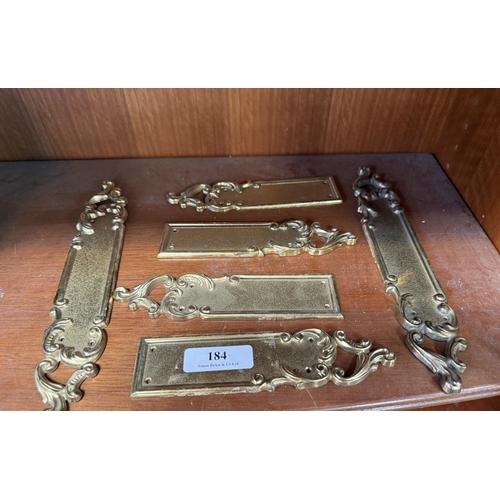 184 - Six pairs of gilt metal door finger plates