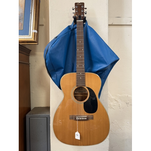 188 - A Fender model F-25 acoustic guitar and case
