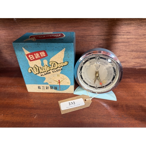 232 - A vintage White Dove alarm clock complete with original box