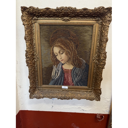 239 - A gilt framed portrait wool work