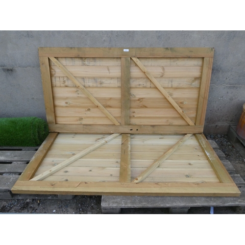 114 - A pair of wooden tongue and groove entrance gates