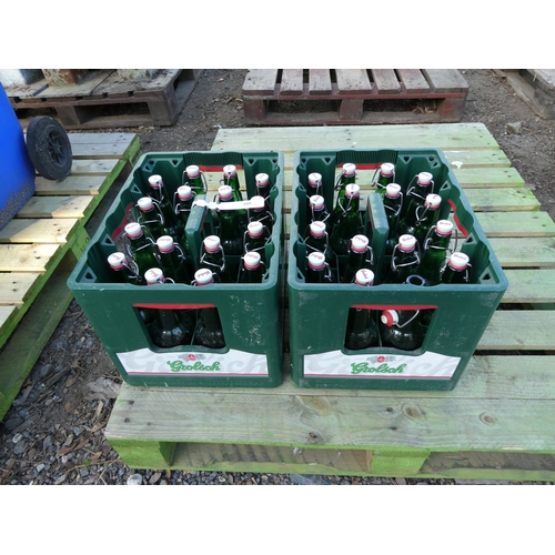 105 - Two Grolsch beer crates containing a quantity of Grolsch flip top beer bottles