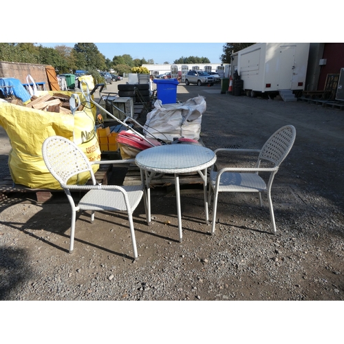 109 - An all weather rattan circular bistro table and two chairs