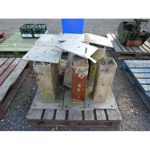112 - Fourteen substantial galvanised fence post bases