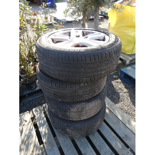 60 - A set of four BMW alloy wheels fitted 205/55ZR16 tyres