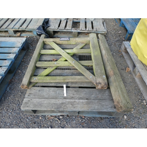 64 - A wooden entrance gate complete with post