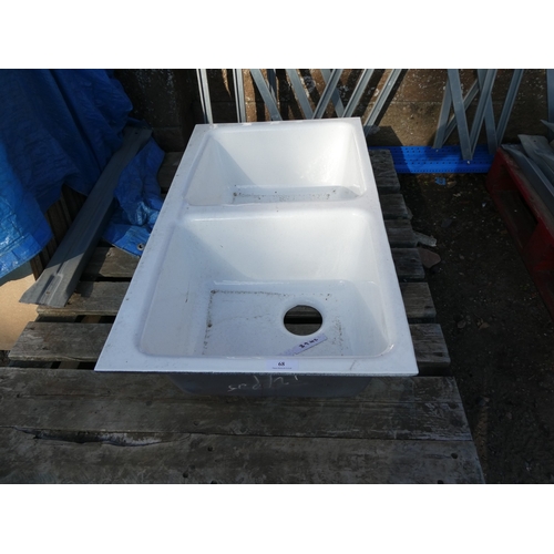 68 - A contemporary cast iron and enamel double bowl sink