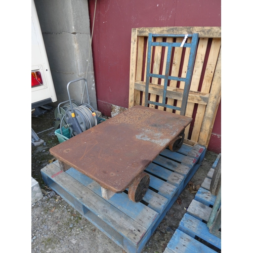 93 - A vintage heavy duty four wheel trolley