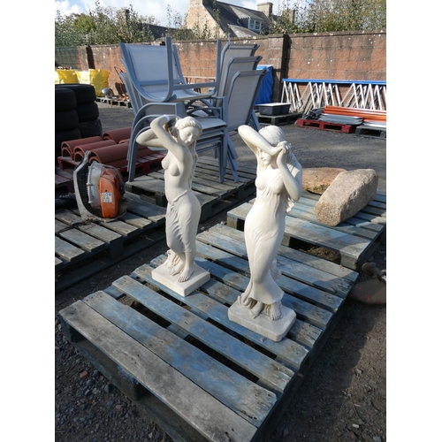 99 - Two reconstituted stone garden statues of the semi naked female form 85cm tall