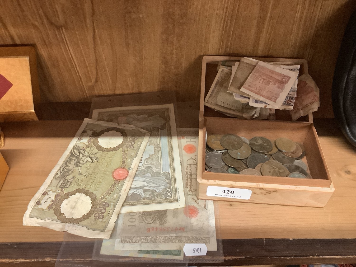 An accumulation of vintage coinage and bank notes