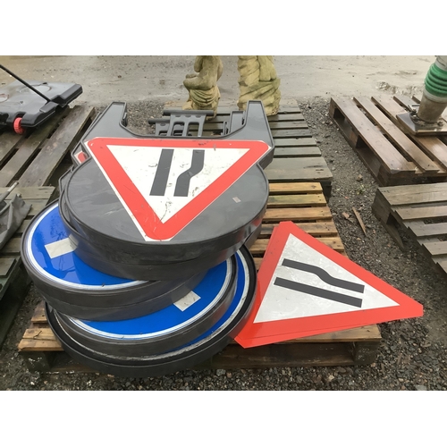 66 - Several road works warning signs