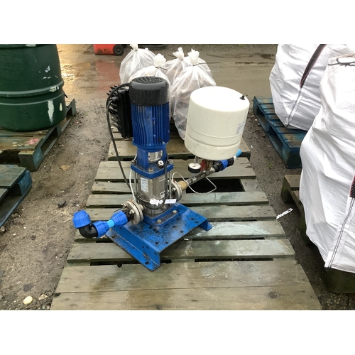 87 - A Lowara water pump and pressure vessel