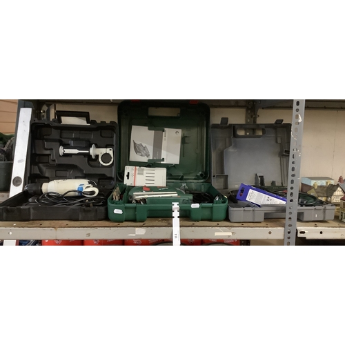 114 - A Bosch rotary hammer drill and jigsaw together with a Mac Allister rotary hammer drill