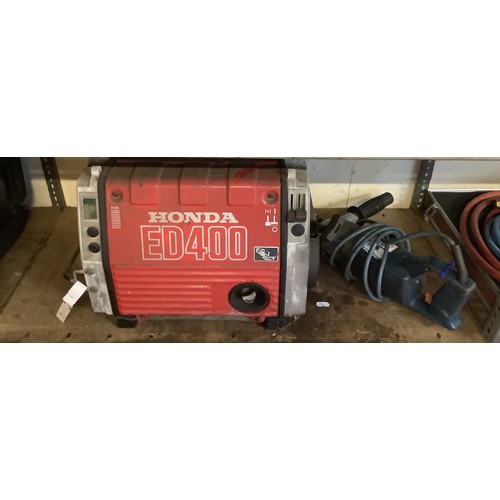 101 - A Honda ED400 portable generator together with a rotary hammer drill