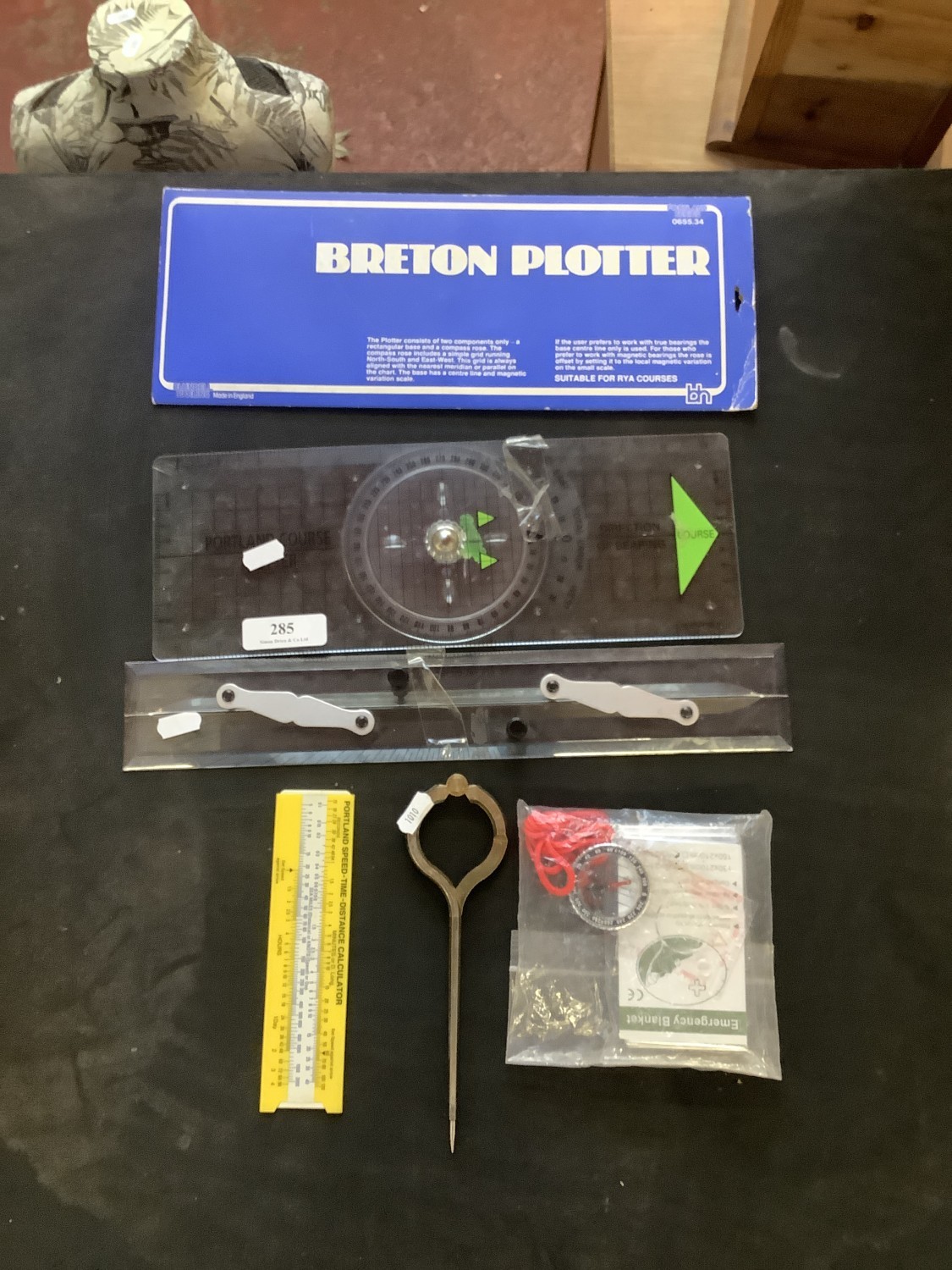 Assorted navigational plotting instruments