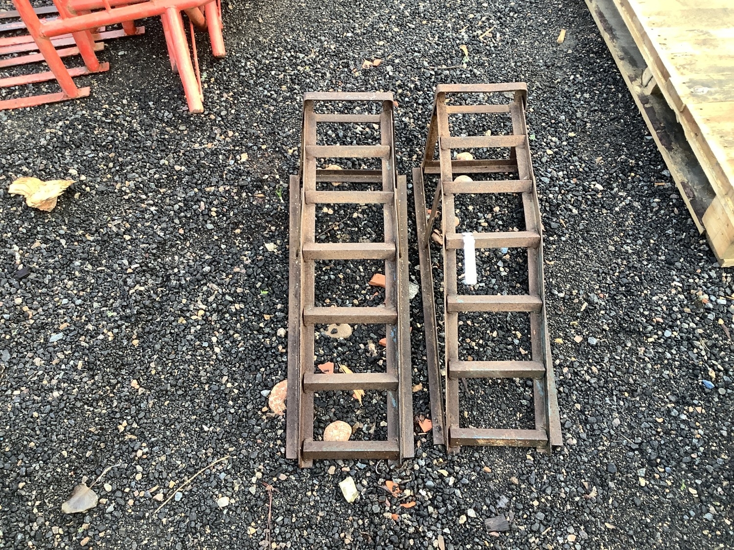 A pair of vehicle inspection ramps
