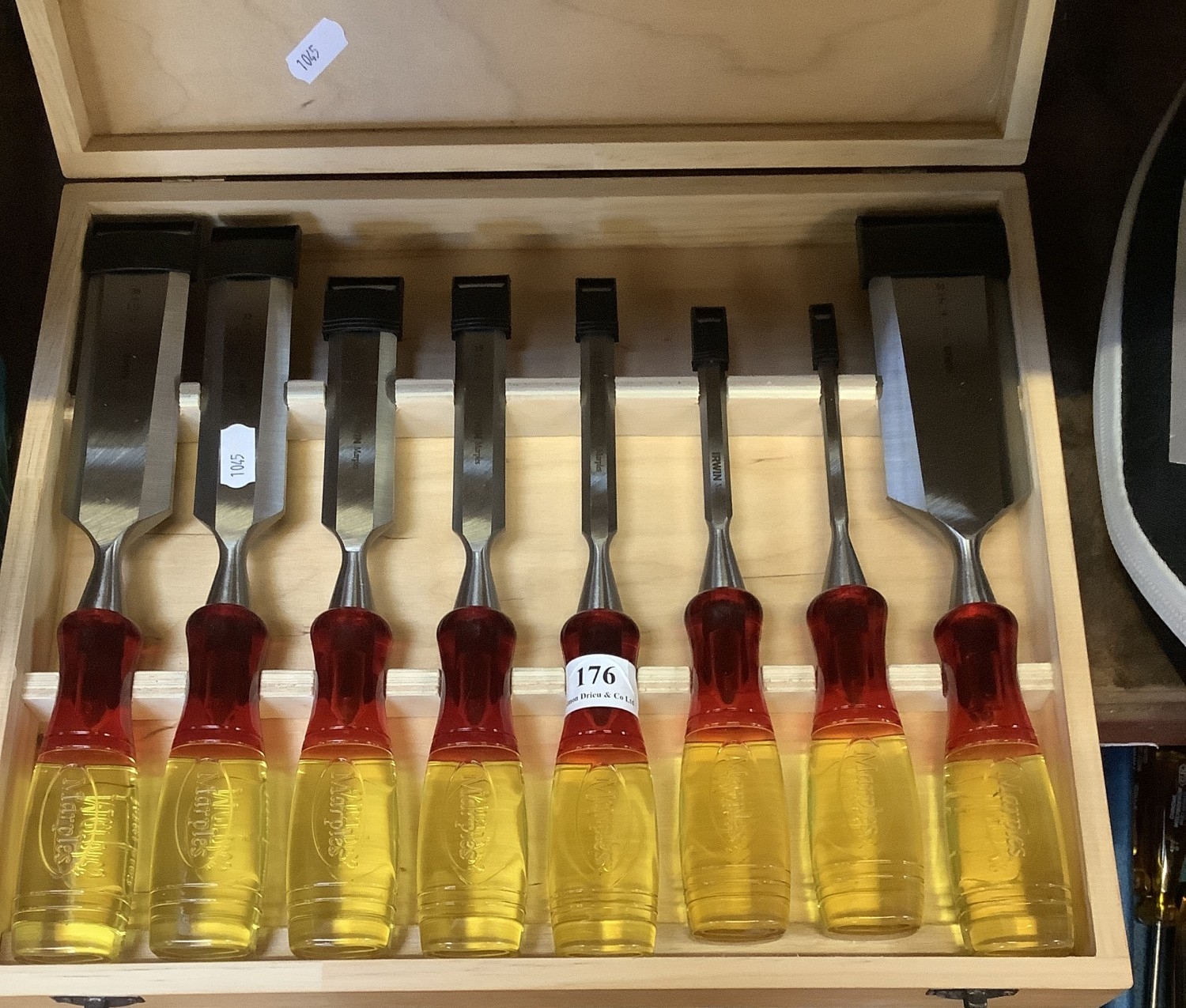 A boxed set of eight Irwin Marples chisels