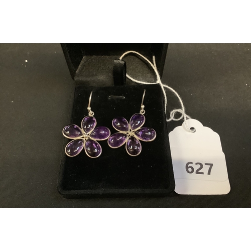 A pair of amethyst and silver flower drop earrings