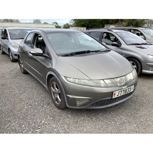 14 - A 2007 Honda Civic 1.8 five door hatchback J77833 (petrol/manual), odometer reading 99,664 miles