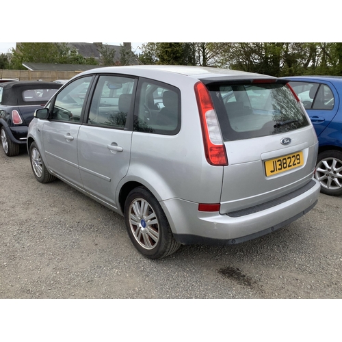 19 - A 2004 Ford Focus C-Max Ghia 1.8 MPV J138229 (petrol/manual), odometer reading 82,792 miles