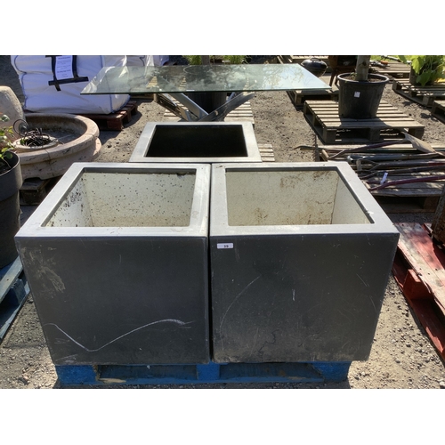 39 - A set of 3 simulated lead planters of large proportion