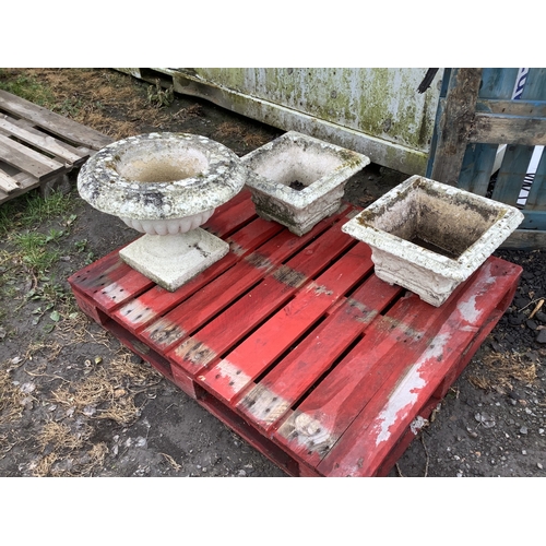 103 - A pair of reconstituted stone planters of square tapered form together with one other