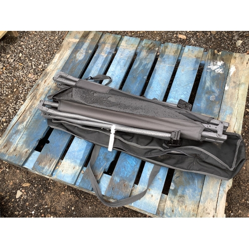 108 - A folding camp bed