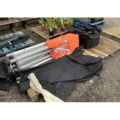 111 - A large aluminium commercial gazebo and accessories