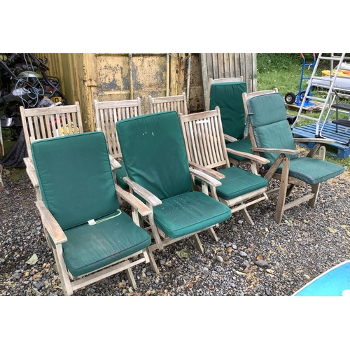 74 - A set of six teak folding garden chairs together with a pair of teak folding garden chairs