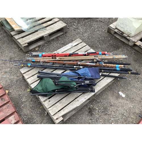79 - A varied assortment of fishing rods, a fishing reel and two fishing chairs