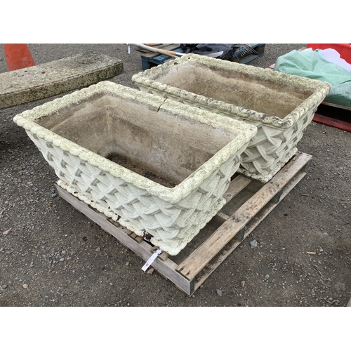 88 - A pair of substantial reconstituted stone planters of rectangular form with lattice design decoratio... 
