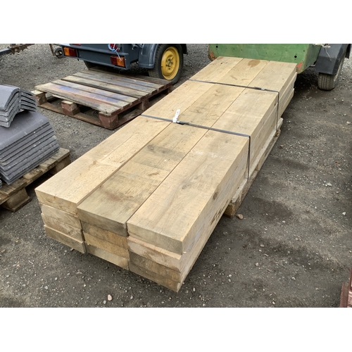 99 - Twelve lengths of heavy landscaping timber - unused 240cm x 25cm x 7.5cm