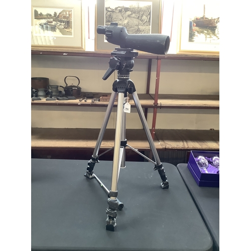 A Bushnell Spacemaster spotting scope on tripod