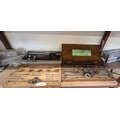Two tap and die sets together with an adjustable set square and two ...