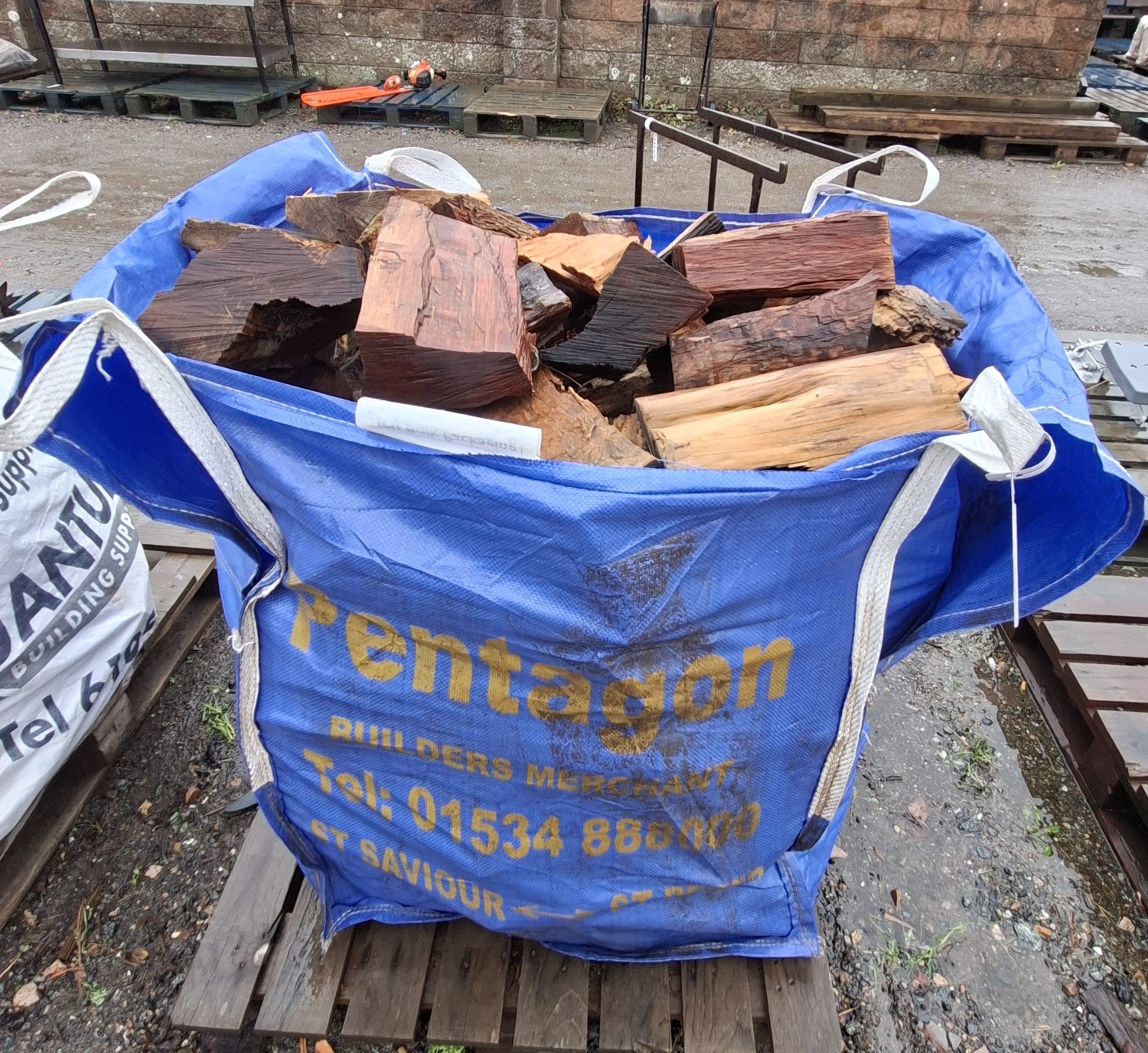 A bulk bag of seasoned logs