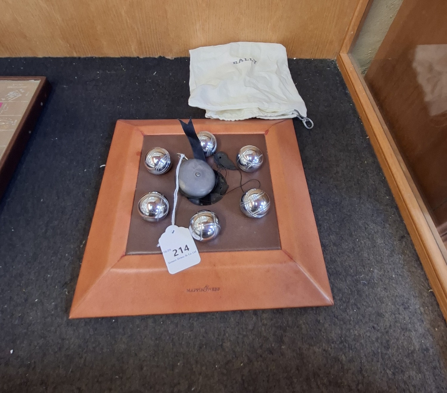 A carpet petanque set by Messrs. Mappin & Webb