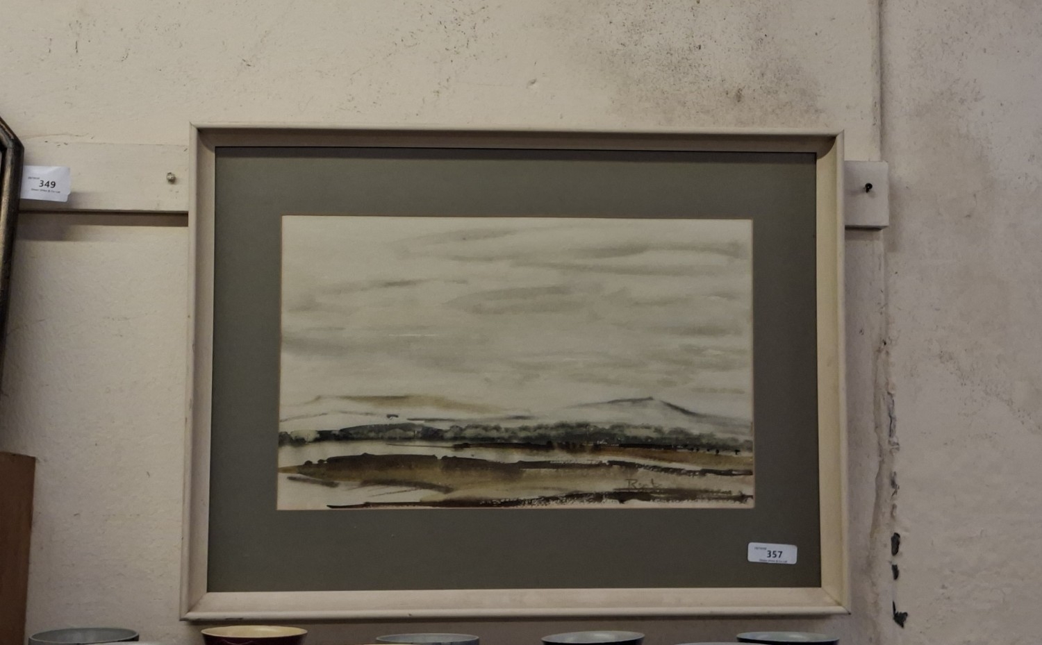 A water colour of an abstract landscape signed