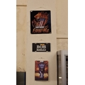 Three metallic wall signs