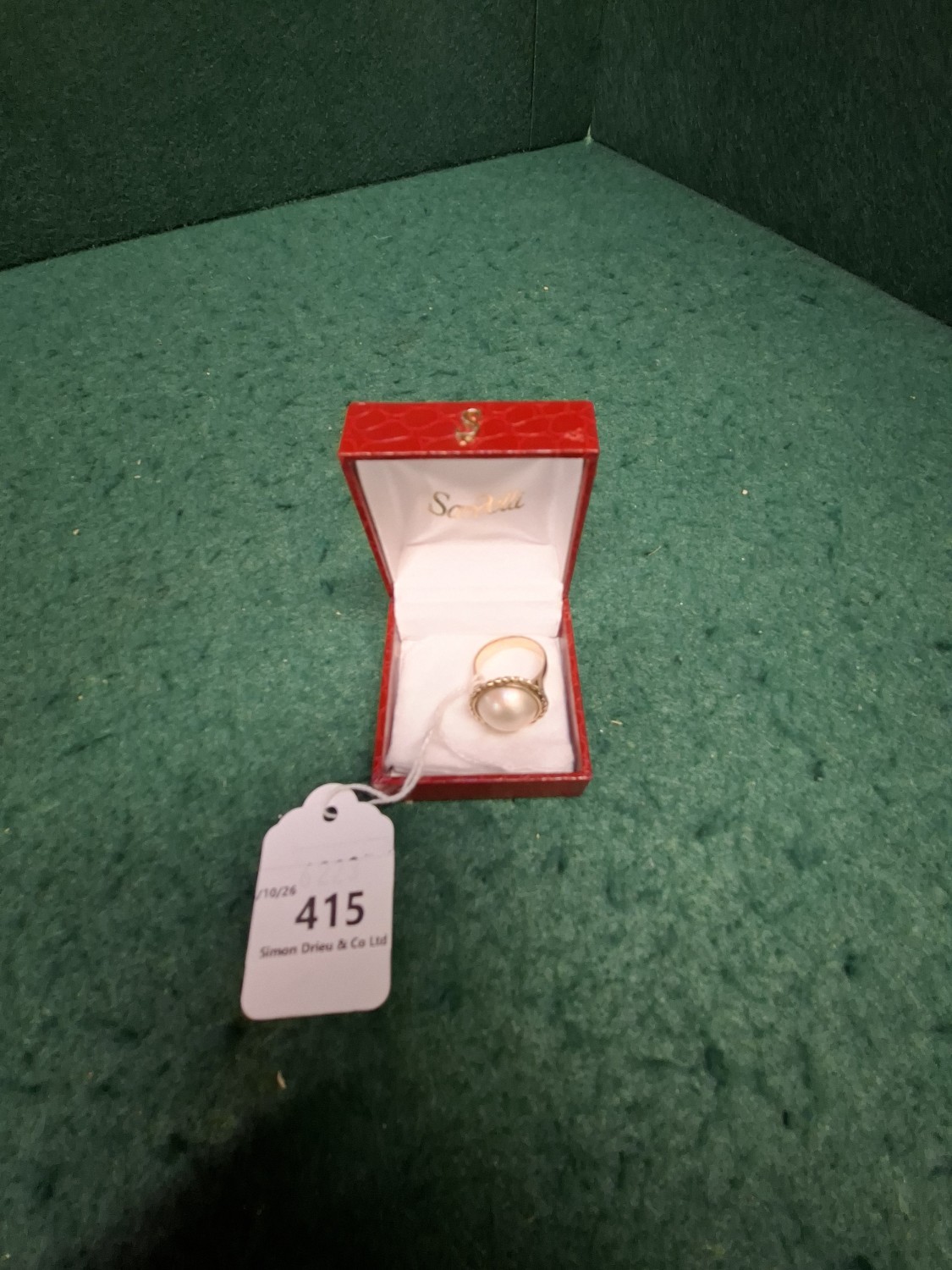 A gold (resized no hallmark) solitaire pearl ring