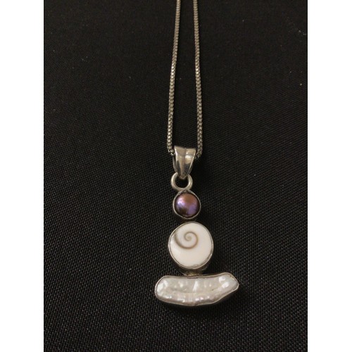 34 - Mother of pearl & black pearl set silver pendant & chain