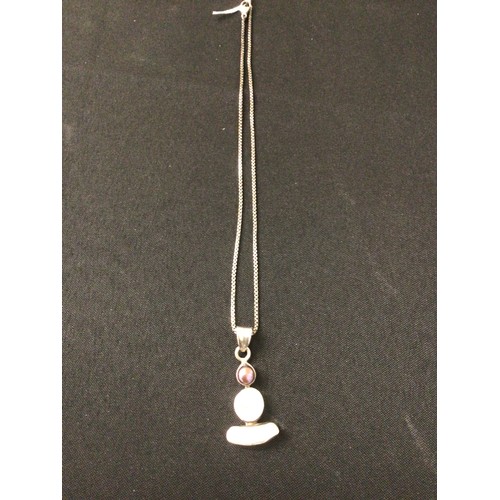 34 - Mother of pearl & black pearl set silver pendant & chain