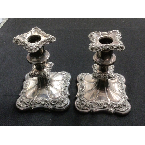 40 - Pair of plated candlesticks