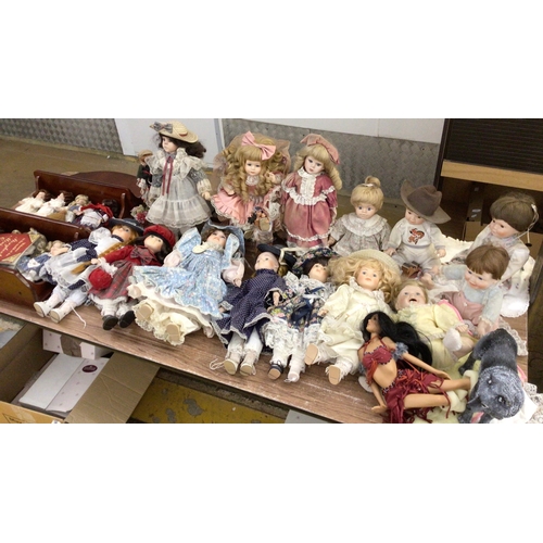 22 - Collection of porcelain dolls, some boxed