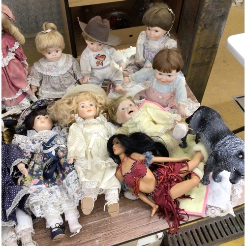 22 - Collection of porcelain dolls, some boxed