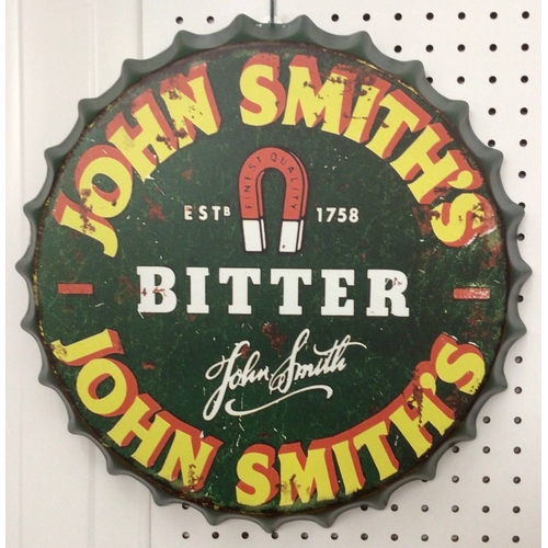 23 - John Smith’s Bitter reproduction metal wall plaque 41cm bottle top effect