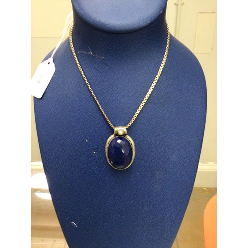 57 - Silver blue stone necklace