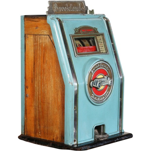 8 - Brooklands Coin Operated One Arm Bandit Slot Machinefeaturing a racing car on front casting, mechani... 